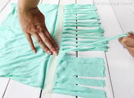 Fold the strands in half. 10 Minute Fringe Infinity T Shirt Scarf The Thinking Closet