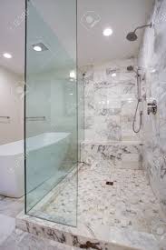 Rain‑x® can be used on glass shower doors without any etching to achieve the benefits of rain‑x® water beading in the shower. Sleek Bathroom Features Large Walk In Frameless Glass Shower Stock Photo Picture And Royalty Free Image Image 96146318
