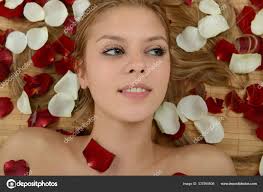 Woman Rose Petals — Stock Photo © PantherMediaSeller #337560608