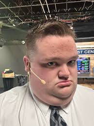 I feel like Britney Spears or the Backstreet Boys about to take stage  everytime I wear this microphone! Why am I wearing this? I am going to do  the weather outside for