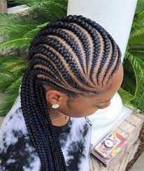 The cornrows are designed into a heart which makes quite the cute little hairstyle. 2019 African Hair Braiding Beautiful Braided And Cornrow Hairstyles For Your Weekend To Make You Look Stunning And Stylish Cornrow Hairstyles African Braids Hairstyles Natural Hair Styles