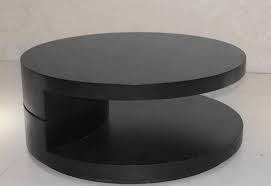 With a stained top, solid edges, and a black steel base, let this coffee table catch the eye of any wandering guest. Black Two Level Round Coffee Table Fort Wayne Indiana Vp110c