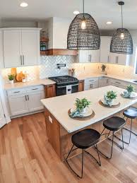 Modern farmhouse style home with industrial design accents and ample natural light. Modern Farmhouse Kitchen Modern Farmhouse Kitchens Open Concept Dining Room Farmhouse Dining Room