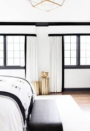 The homes had professionally landscaped yards and half circles for driveways. Why We Re Crazy For Black Trim One Kings Lane Style Blog