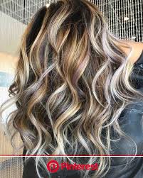 These soft toffee highlights look incredible against the brown hair. Blonde Highlights On Brown Hair Dark Chocolate Hair Color Brown Hair With Blonde Highlights Brown Blonde Hair Clara Beauty My