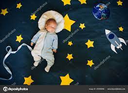 Baby Boy Is Asleep And Dreams Himself An Astronaut In Space Stock Photo By C Alexkoral 202666668
