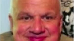 Scott County coroner facing federal charges