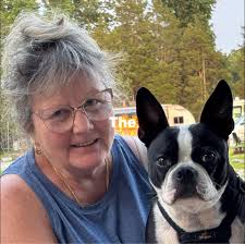 Is my dog a purebred Boston Terrier or a mix?