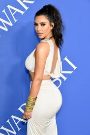 The deep center part makes the hair at the two parts even and soft. Kim Kardashian Wears Her Hair In Natural Waves For 2018 Cfda Awards Allure