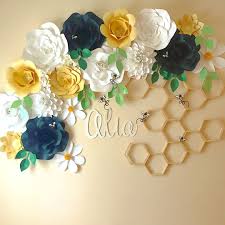 This beautiful combination of flowers and diapers is a wonderful choice for your baby shower. Baby Shower Flower Decor Bee Decorations Bumble Bee Wedding Decoration Ideas Babies Room Decorations Home Decor Flower Paper Party Supplies Party Decor