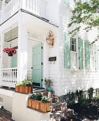 Exterior shutters and beach homes are a classic match. 56 Reference Of Barn Door Gray Mint Green Green Shutters Exterior House Colors House Paint Exterior