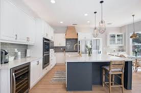Kitchen With White Cabinets Dark Gray Island Marble Countertops And Glass Subway Tile Grey Kitchen Island Gray Island Kitchen Cabinets Grey And White