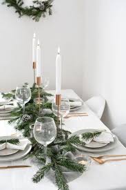 Minimalist Christmas Decor With Gold Cutlery And Copper Candleholders In 2020 Scandinavian Christmas Decorations Christmas Table Settings Minimalist Christmas Decor