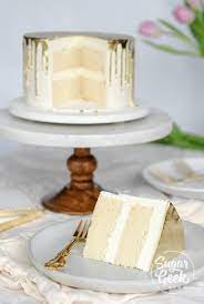 A ribbon of textured white icing adds dimension across the tiers. White Cake Recipe From Scratch Soft And Fluffy Sugar Geek Show