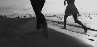 The Brutally Honest Phases Of A Man Falling In Love Running On The Beach Black And White Beach Couple Running