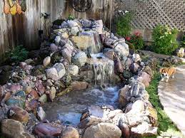 So Relaxing The Sound Of Water In The Backyard Waterfalls Backyard Ponds Backyard Waterfall Small Backyard Ponds