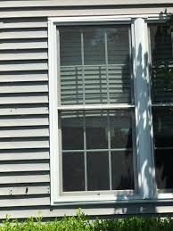 Hunter green exterior color provides a pop of color. Shutter Issue With Double Windows