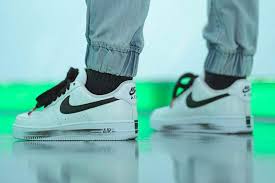 This pair essentially flips the color blocking of the original, featuring a black swoosh on a white leather upper, its top layer designed to wear away. G Dragon Peaceminusone X Nike Air Force 1 Para Noise Hypebae