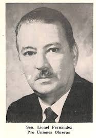 Magnifico edificio propiedad de don José Piza, construido recientemente en  Arecibo. En la foto don Julio Tomás Martínez, autor del proyecto, y  director de la construcción. Puerto Rico Ilustrado Año 1911.