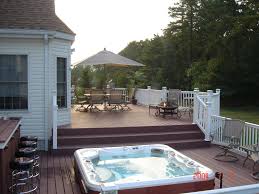 outdoor deck design love it and esp love how the hot tub is slightly sunken in but not completly decks backyard building a deck hot tub deck design