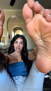 Olivia Queen latex catsuit peeled to waist