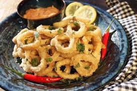 Crispy Calamari With Spicy Dipping Sauce Recipe Yummly Recipe Spicy Dipping Sauce Healthy Asian Recipes Dipping Sauces Recipes