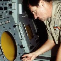 CHIEF Aerographer's Mate (AGC) Rueben Ritchie operates the FPS-106 weather  radar at the Naval Oceanographic Command Facility