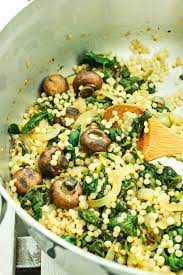 Israeli Couscous With Spinach And Mushrooms Recipe Couscous Recipes Recipes Spinach Stuffed Mushrooms