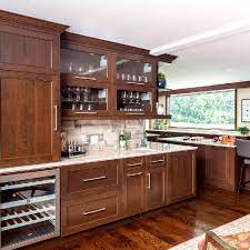 Recessed panel drawer fronts and a luxurious glaze finish make this traditional kitchen a timeless classic. Kitchen Cabinets Manufacturers Binns Kitchen Bath Design