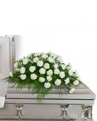 Each casket spray comes with an easel stand and card. Peaceful In White Casket Spray Sympathy In Burnt Hills Ny The Country Florist