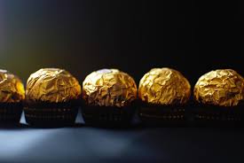 A crunchy specialty with a velvety hazelnut cream filling; Ferrero Rocher Pictures Download Free Images On Unsplash