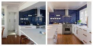 white kitchen with dark blue tiling