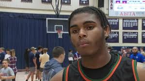 Senior Jaylon Hicks & Head Coach Nate Roche after Carver's quarterfinal win  over Hannan