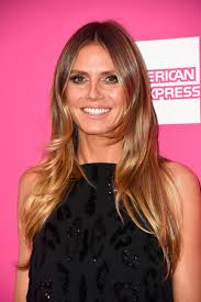The slicked look is still out for debate, but some would argue heidi can pull anything off. Heidi Klum Long Center Part Heidi Klum Hair Looks Stylebistro