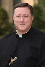 Holy Cross H.S. Installs New President