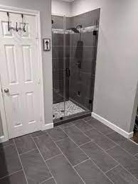 Style Selections Galvano Charcoal 12 In X 24 In Glazed Porcelain Granite Stone Look Floor And Wall Tile Lowes Com In 2021 Small Bathroom Makeover Bathroom Wall Tile Dark Tile Bathroom