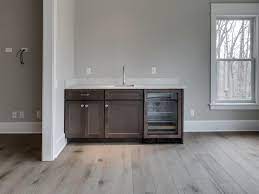 The appliances and other paraphernalia are generally ensconced in cabinetry that matches the decor of the bedroom. Master Bedroom Coffee Bar Kingston Royce