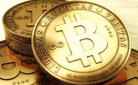 A gold coin with the initials bc inscribed on it. The Great Bitcoin Logo Debate