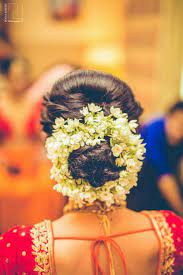 Pin By Sravya Chirandas On Weddings Brides Outfits Beautiful Moments Indian Bride Hairstyle Braided Bun Hairstyles Bride Hairstyles