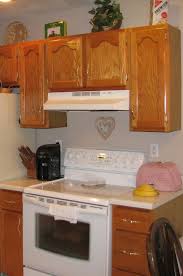 Measure the length and height of the space above the cabinets. Kitchen Cabinets Take Them Up To The Ceiling Or Not