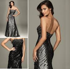 Stunning Evening Dresses With Strapless Sheath Sequins Follow An Asymmetrical Pattern Down The Evening Dresses Evening Dress Collection Backless Dress Formal