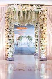 An Orchid Filled Oasis Wedluxe Magazine Wedding Entrance Decor Wedding Table Decorations Diy Wedding Decorations