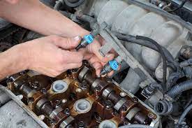 How To Clean Fuel Injectors In The Garage With Carparts Com Truck Repair Car Maintenance Fuel Injection