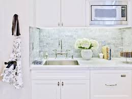 A stone veneer backsplash tells your friends and family you value traditional, natural materials but are bold enough. Tiny Traditional Kitchen With Gray Stone Tile Backsplash Hgtv