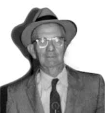 What is the story behind the old grader in the picture?