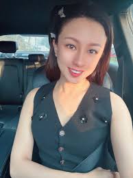 Carrie Lee ( 李诗琪) added a new photo...