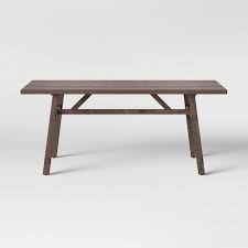 At its base, the faux white marble dining table has a durable stainless steel tulip shaped base, completed in a glamorous gold finish. 72 Bourne Base Dining Table Brown Threshold Target