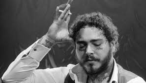 The new look the 23 year old rockstar singer initially posted a semi vague photo of his new hair to twitter last week. Post Malone Skull Head Tattoo Post Malone Face Tattoos