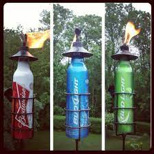 Pin By Amy Laurendeau On For The Home Tiki Torches Beer Crafts Diy Camping Decor