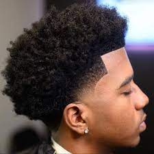 The primary feature of the taper fade is to blend. Pin By New Breed Barber Studio On Haircuts Low Fade Curly Hair Curly Hair Fade Curly Hair Men